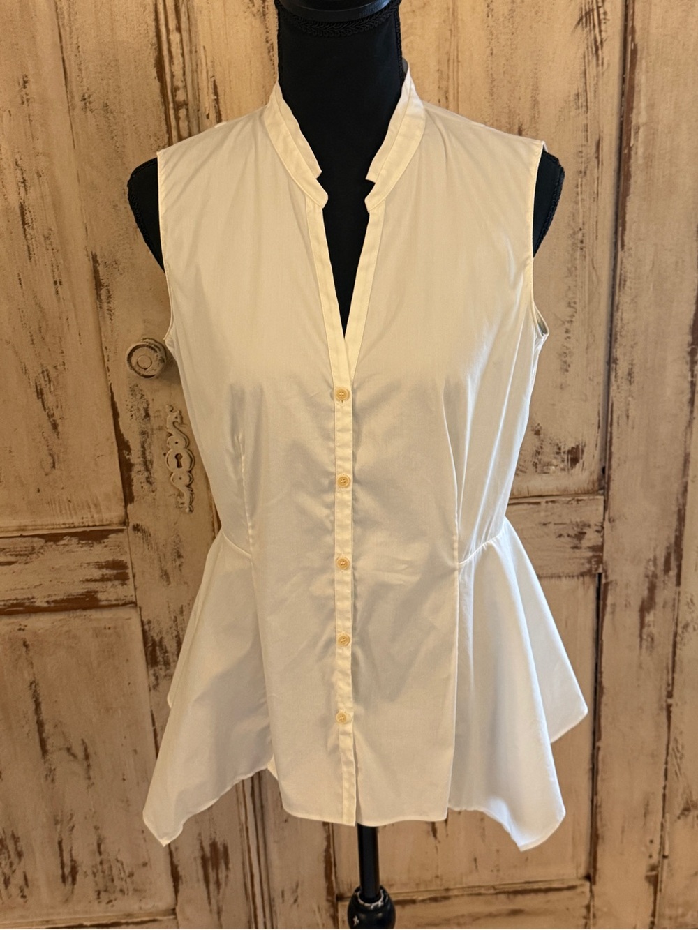 Akris Punto sleeveless peplum shirt. Baumwolle cotton. Cream. US 8. Minimalist